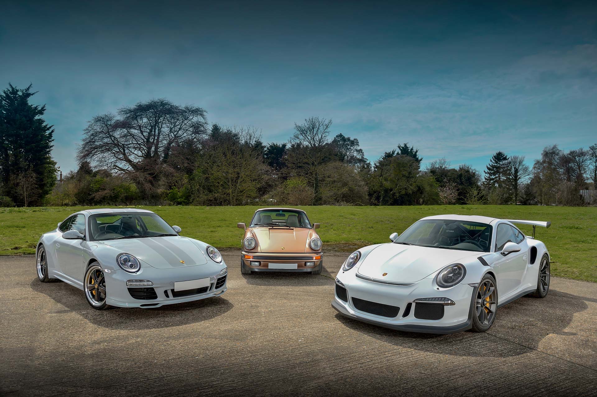 Collection of Porsche cars including 911 Turbo, 911 GT3 RS and Cayenne